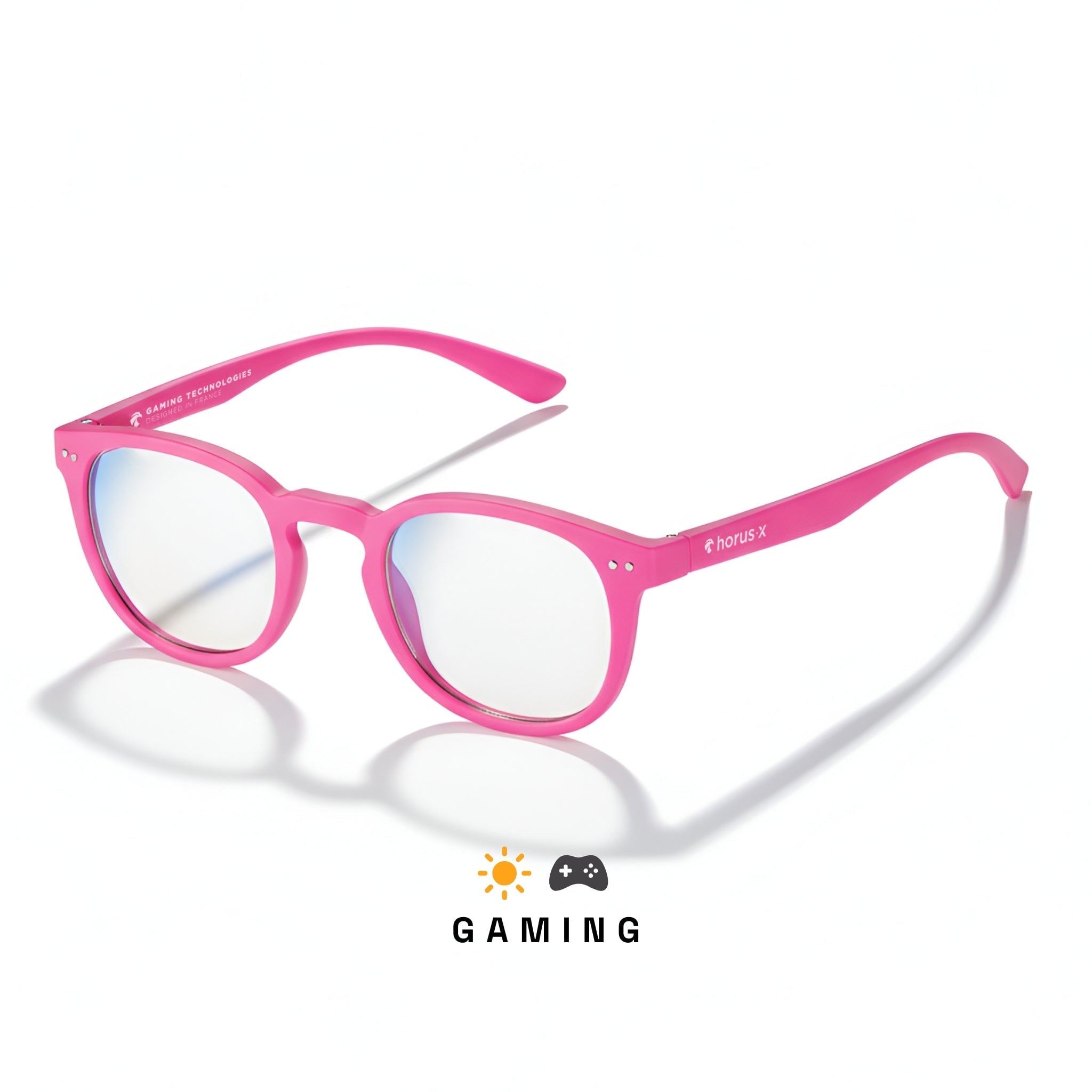 Lunettes gaming rondes roses avec verres ambrés sur fond blanc