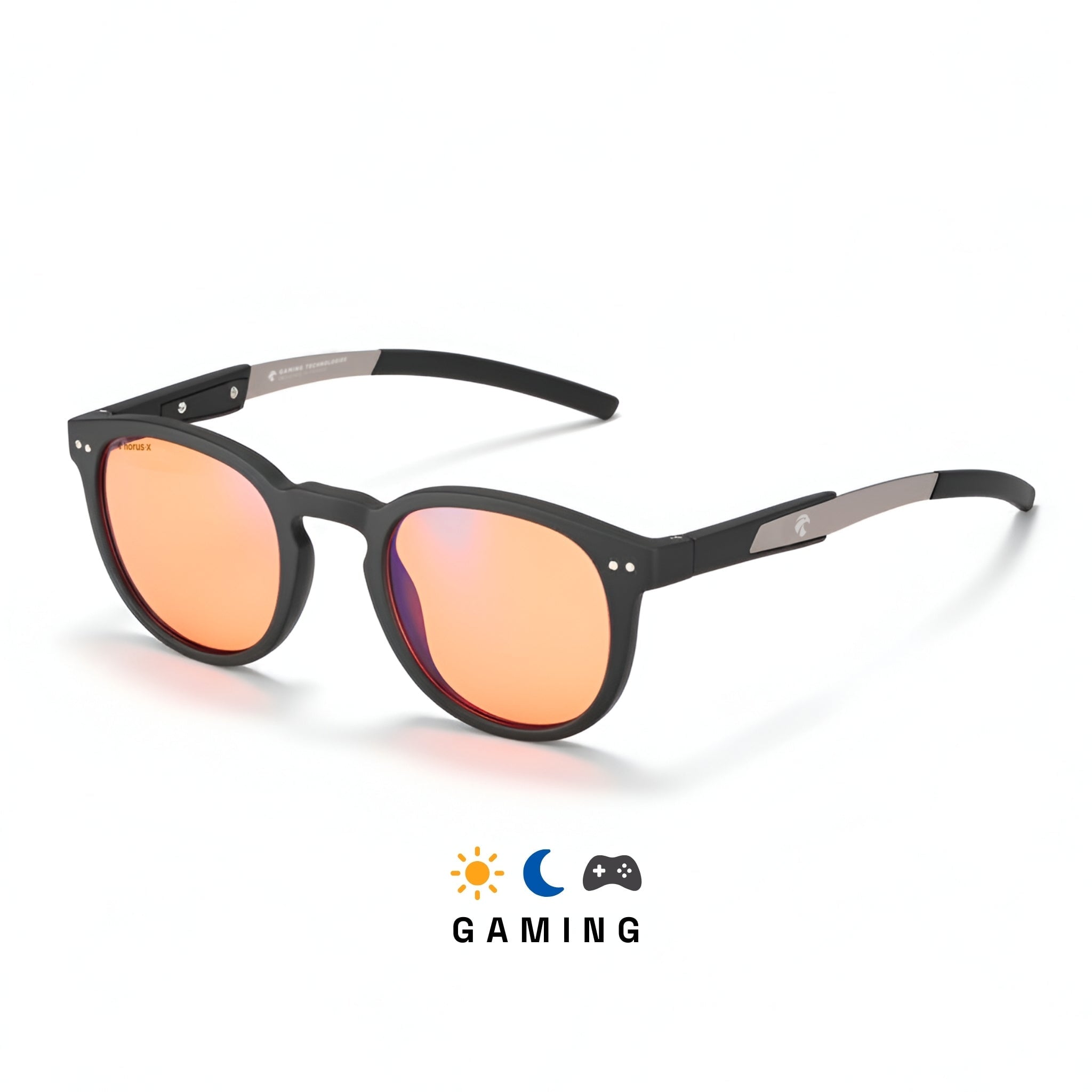 Lunettes gaming anti lumière bleue rondes et noires avec verres ambrés, branche en métal et embout en silicone noir sur fond blanc